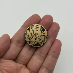 In hand, from Pokémon Coin Fan, full size