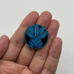 In hand, from Pokémon Coin Fan, full size