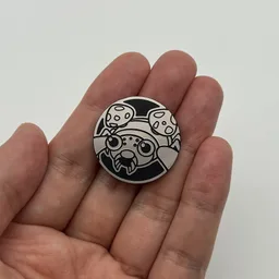 In hand, from Pokémon Coin Fan, full size