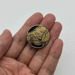 In hand, from Pokémon Coin Fan, full size