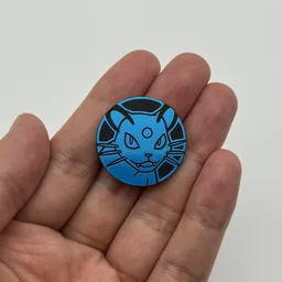 In hand, from Pokémon Coin Fan, full size