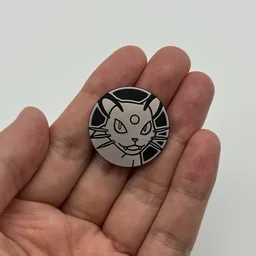 In hand, from Pokémon Coin Fan, full size