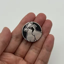 In hand, from Pokémon Coin Fan, full size