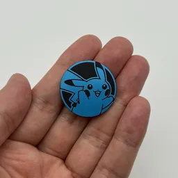 In hand, from Pokémon Coin Fan, full size
