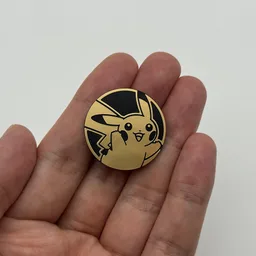 In hand, from Pokémon Coin Fan, full size