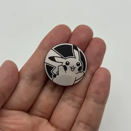In hand, from Pokémon Coin Fan, full size