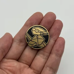 In hand, from Pokémon Coin Fan, full size