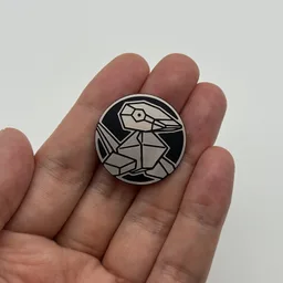 In hand, from Pokémon Coin Fan, full size
