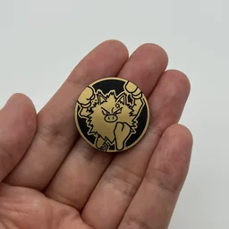 In hand, from Pokémon Coin Fan, full size