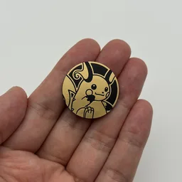 In hand, from Pokémon Coin Fan, full size