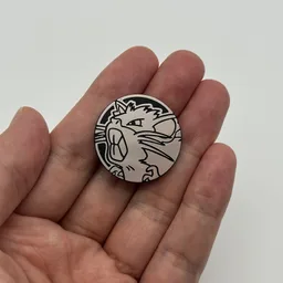 In hand, from Pokémon Coin Fan, full size