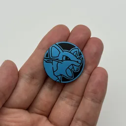 In hand, from Pokémon Coin Fan, full size