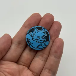 In hand, from Pokémon Coin Fan, full size