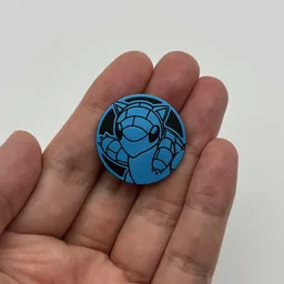 In hand, from Pokémon Coin Fan, full size