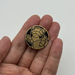 In hand, from Pokémon Coin Fan, full size
