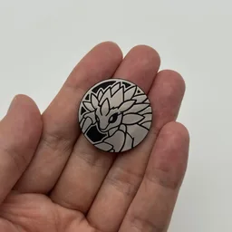 In hand, from Pokémon Coin Fan, full size