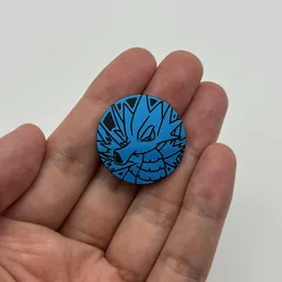 In hand, from Pokémon Coin Fan, full size