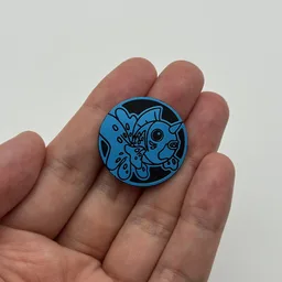 In hand, from Pokémon Coin Fan, full size