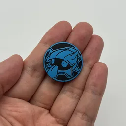 In hand, from Pokémon Coin Fan, full size