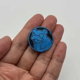 In hand, from Pokémon Coin Fan, full size