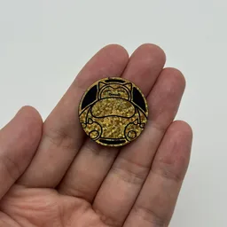 In hand, from Pokémon Coin Fan, full size