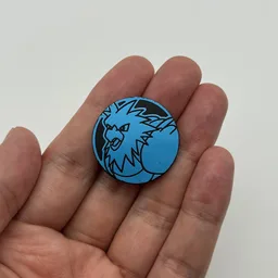 In hand, from Pokémon Coin Fan, full size