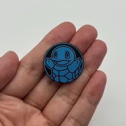 In hand, from Pokémon Coin Fan, full size