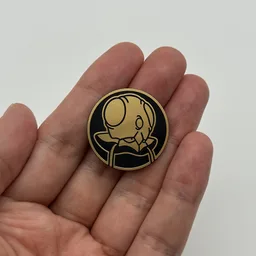 In hand, from Pokémon Coin Fan, full size