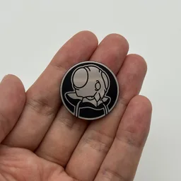 In hand, from Pokémon Coin Fan, full size