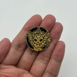 In hand, from Pokémon Coin Fan, full size