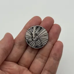 In hand, from Pokémon Coin Fan, full size