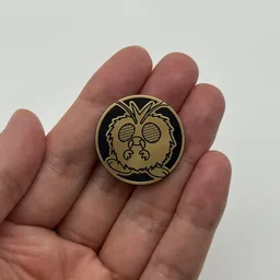 In hand, from Pokémon Coin Fan, full size