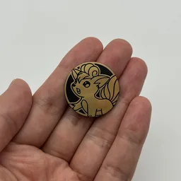 In hand, from Pokémon Coin Fan, full size