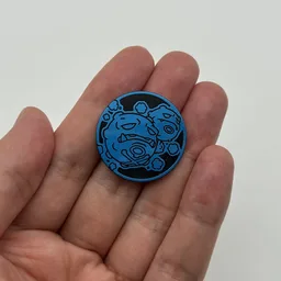 In hand, from Pokémon Coin Fan, full size