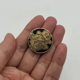 In hand, from Pokémon Coin Fan, full size