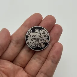 In hand, from Pokémon Coin Fan, full size