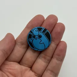 In hand, from Pokémon Coin Fan, full size