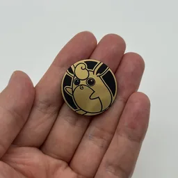 In hand, from Pokémon Coin Fan, full size