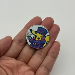 In hand, from Pokémon Coin Fan, full size