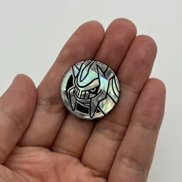 In hand, from Pokémon Coin Fan, full size