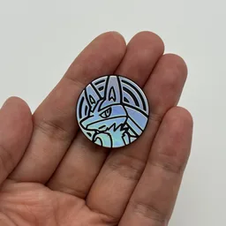 In hand, from Pokémon Coin Fan, full size