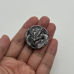 In hand, from Pokémon Coin Fan, full size