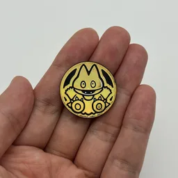 In hand, from Pokémon Coin Fan, full size