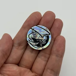 In hand, from Pokémon Coin Fan, full size