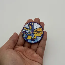 In hand, from Pokémon Coin Fan, full size