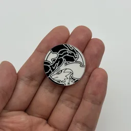 In hand, from Pokémon Coin Fan, full size