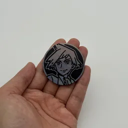 In hand, from Pokémon Coin Fan, full size