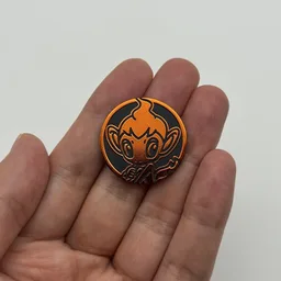 In hand, from Pokémon Coin Fan, full size