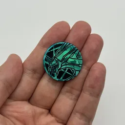 In hand, from Pokémon Coin Fan, full size