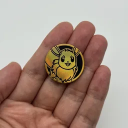 In hand, from Pokémon Coin Fan, full size
